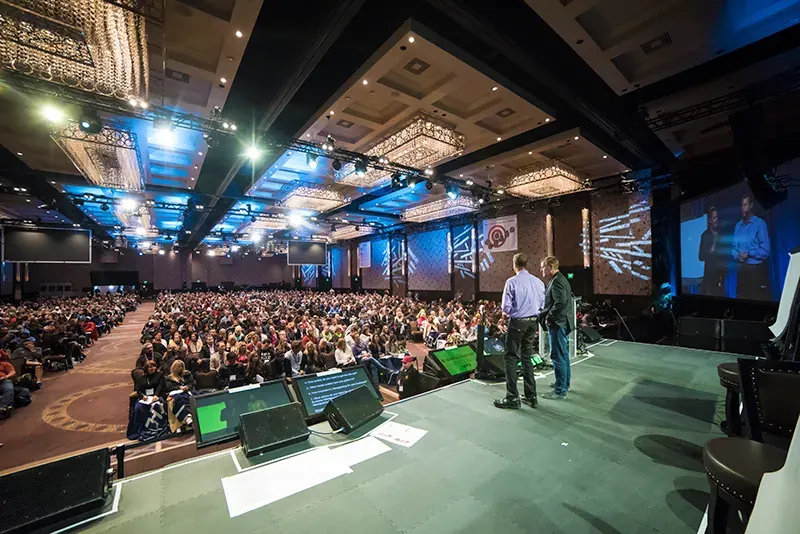 Mitch Jackson speaking alongside David Meerman Scott at Tony Robbins Business Mastery